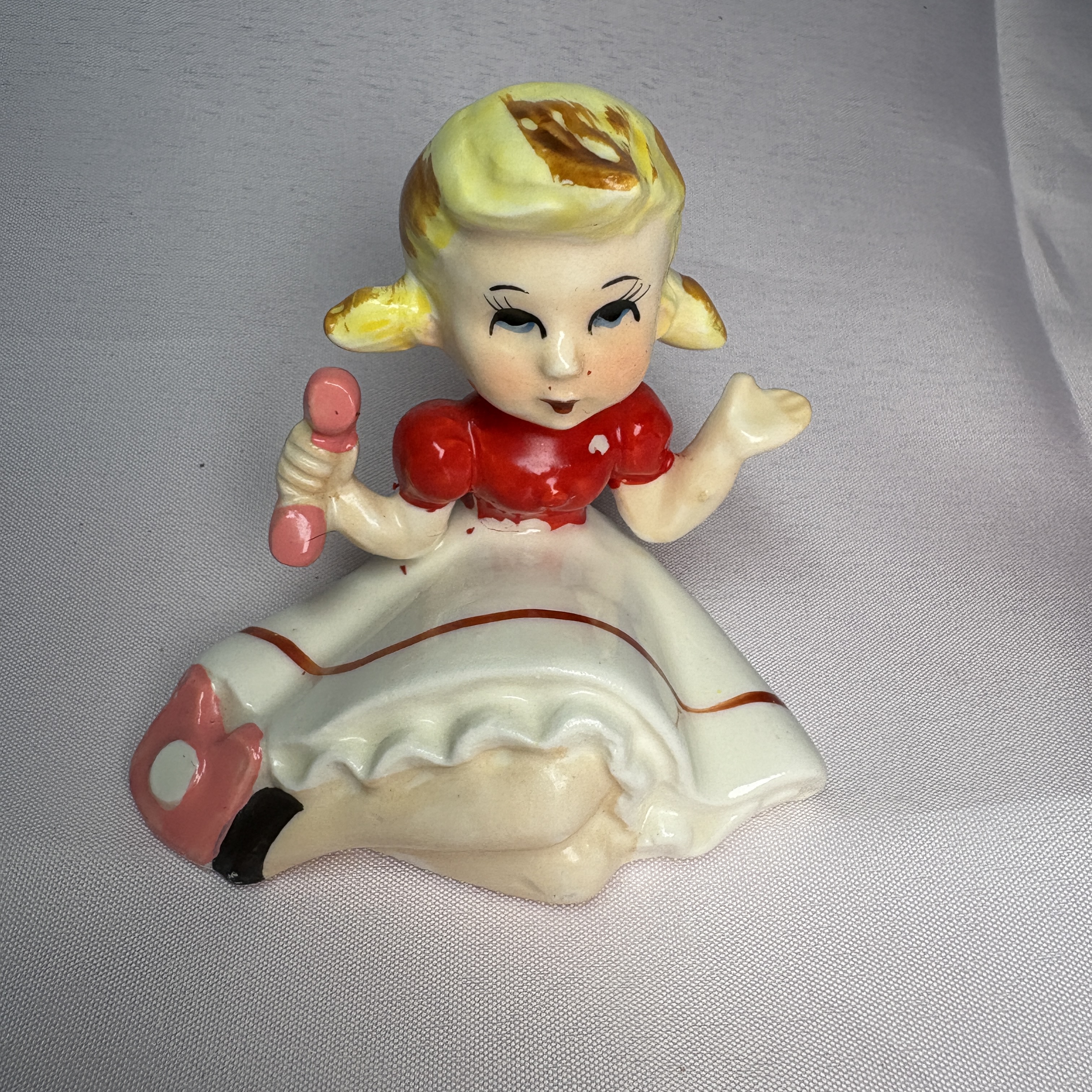 Blonde 50’s Teen Girl On Pink Phone Ceramic figurine