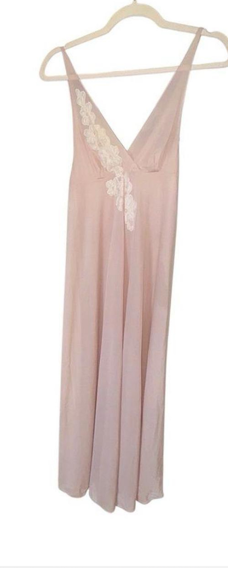 Vintage Vassarette piece with intricate lace accents. Soft pink color.