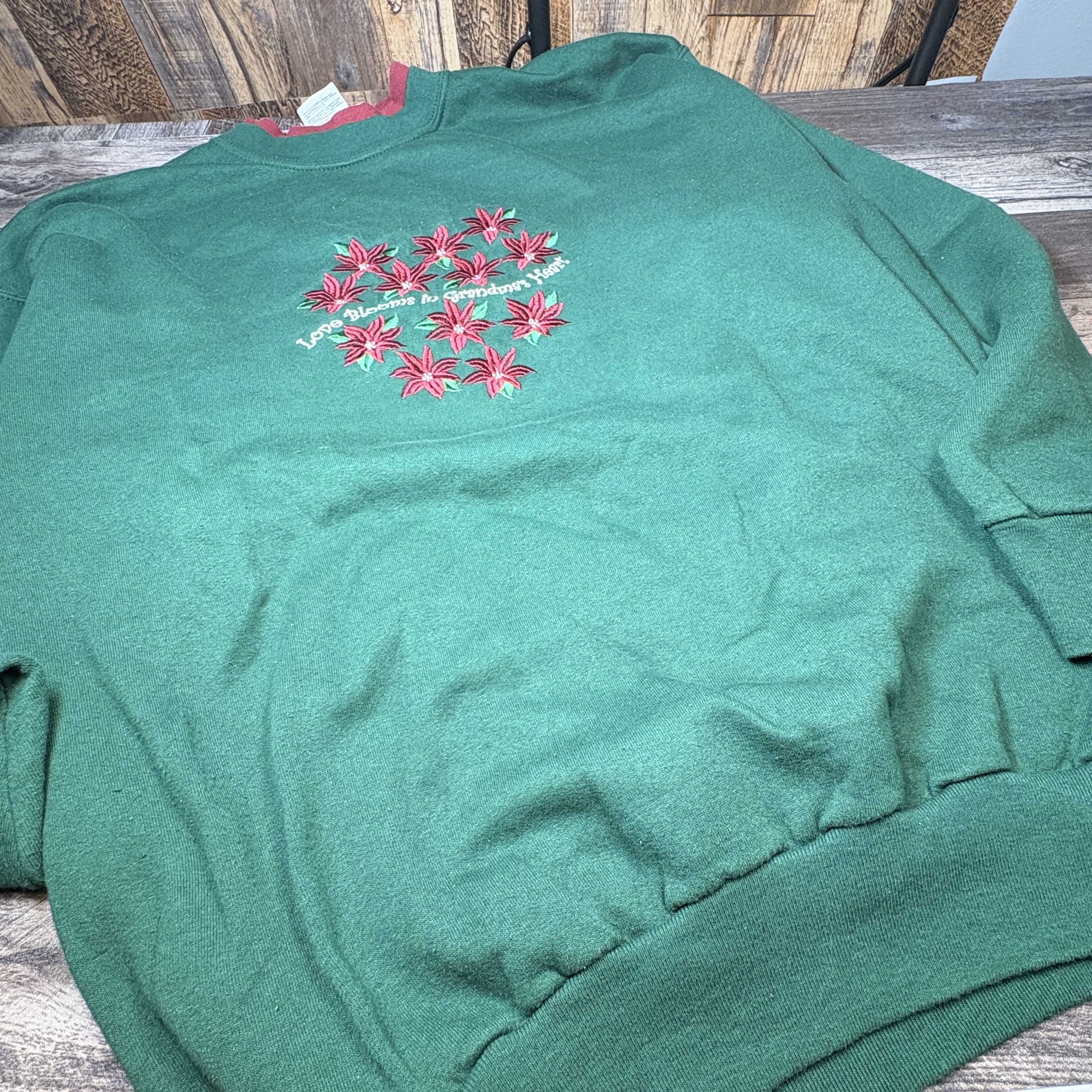 🌸 Green Grandma Sweatshirt – “Love Blooms in Grandma’s Heart”