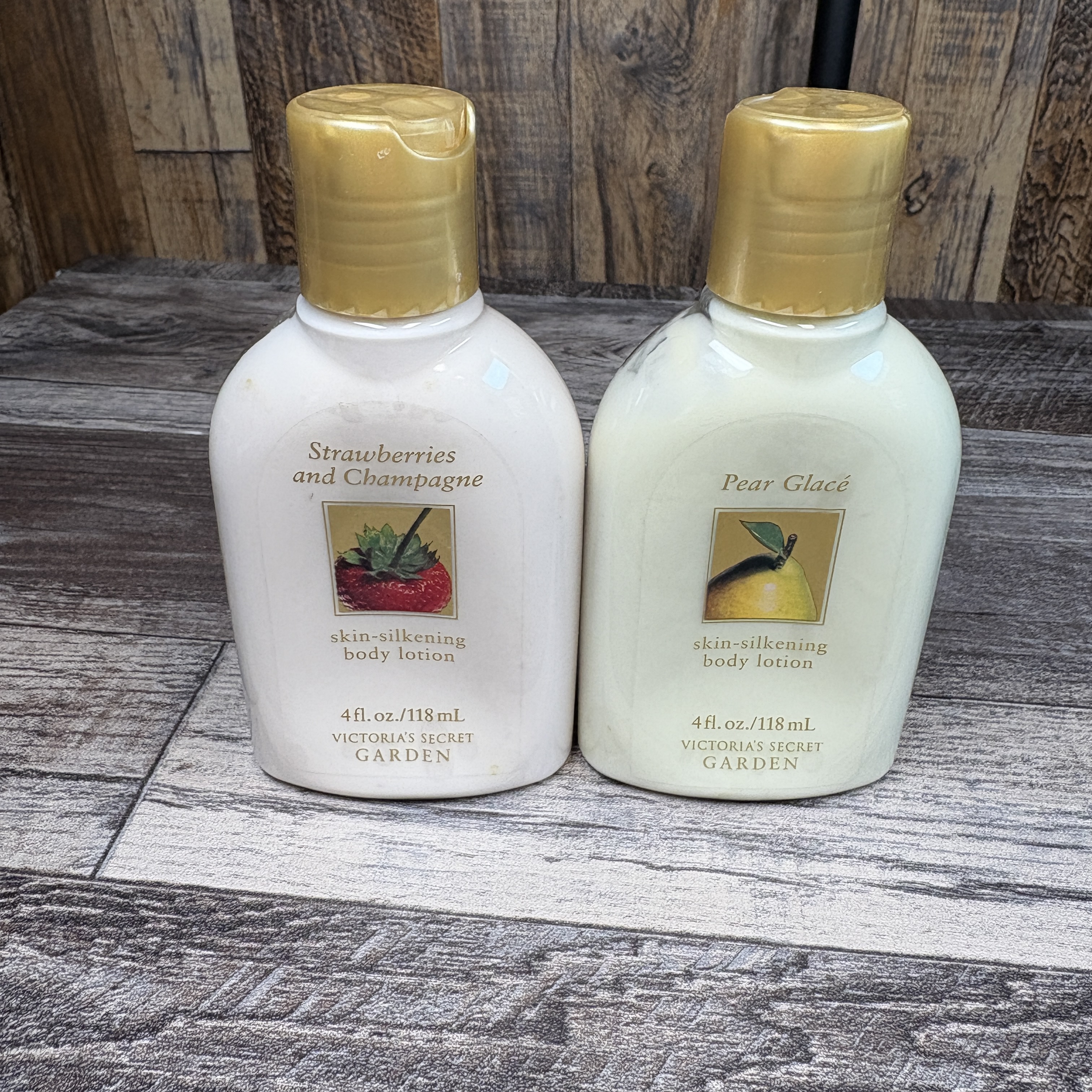 Victoria’s Secret Garden Mini Lotions – Strawberries & Champagne + Pear Glacé (Vintage 4 fl oz / 118 mL Bottles)